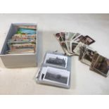 A box of postcards of mixed subjects including European scenes, South West tourist spots, American
