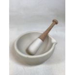 A large Mortar and pestle 9inch diameter