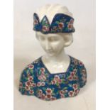 A 1930s French crackle glazed ceramic bust by Les Bleus de Louviere, decorated with floral enamel.