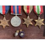 WWII medals Italy Star, Africa star, the 1939-45 star also 1939-45 medallion also with ephemera