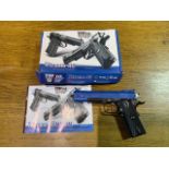 An Extreme 45bv co2 powered air soft gun. In box with manual.