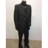 A mens three piece pinstripe flared suit by Hepworth tailored by Hardy Amies also with a white