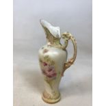 Royal Worcester blush ivory hand painted ewer with part reticulated rim, numbered 1587. Decorated