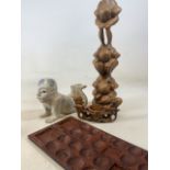 Carved treen ware, weeping bubbahs, a wooden Chinese Ho Ho boy rest also with an African carved
