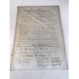 A hand written indenture dated 1853 stapled to frame W:40cm x H:59cm