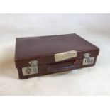 A vintage leather case fabric lined with key and vintage label W:46cm x D:31cm x H:31cm