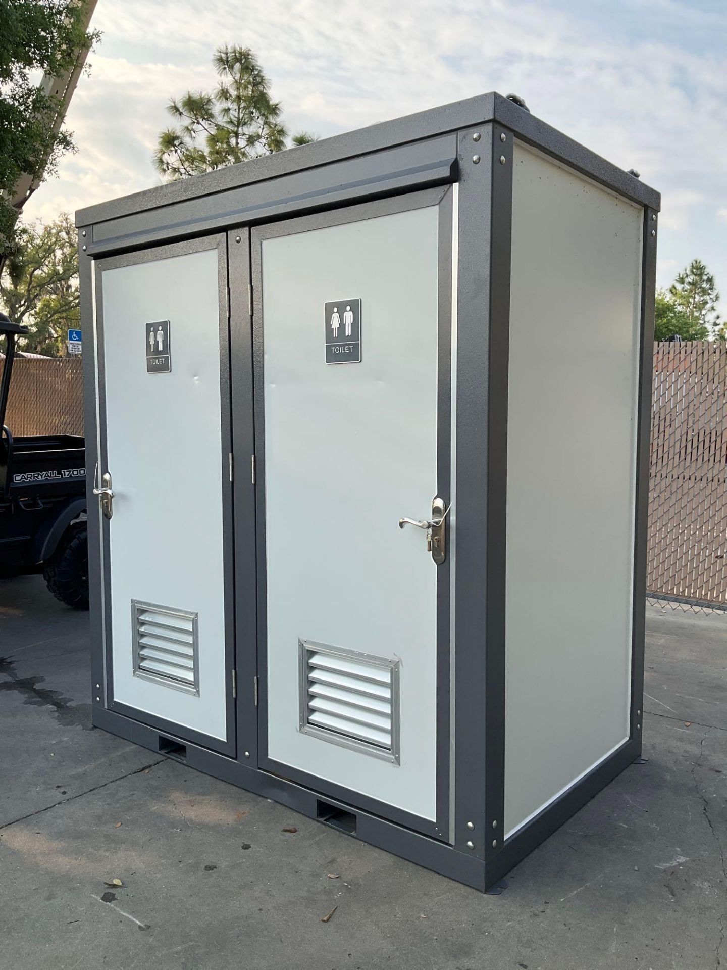 UNUSED PORTABLE DOUBLE BATHROOM UNIT, 2 STALLS, ELECTRIC & PLUMBING HOOK UP WITH EXTERIOR PLUMBING C