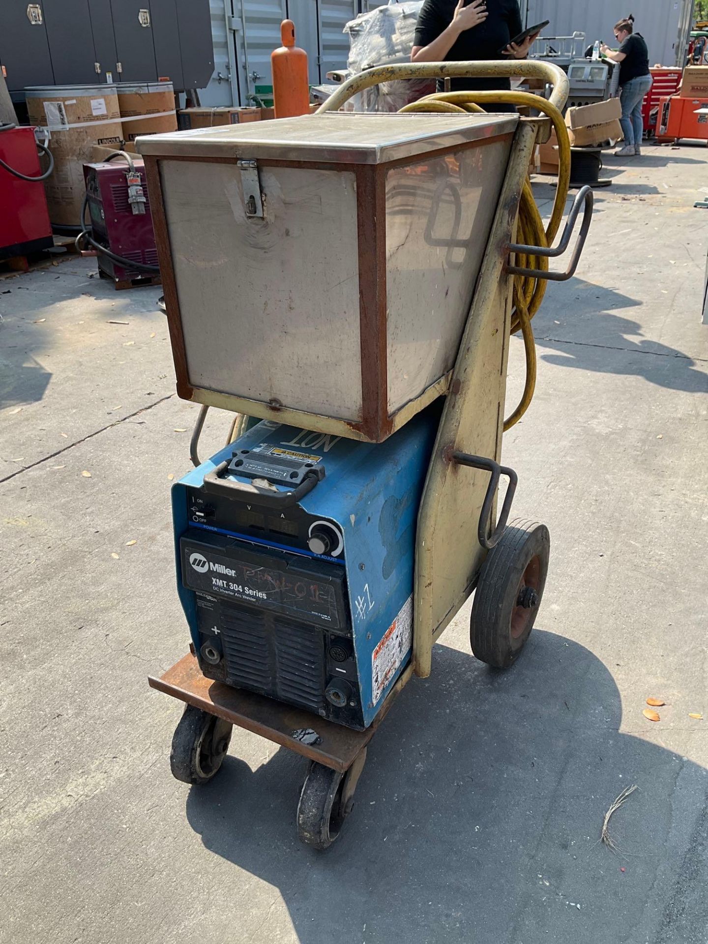 MILLER XMT 304 SERIES DC INVERTER ARC WELDER WITH CART & STORAGE BOX ATTACHED ,  PHASE 1/3 , APPROX