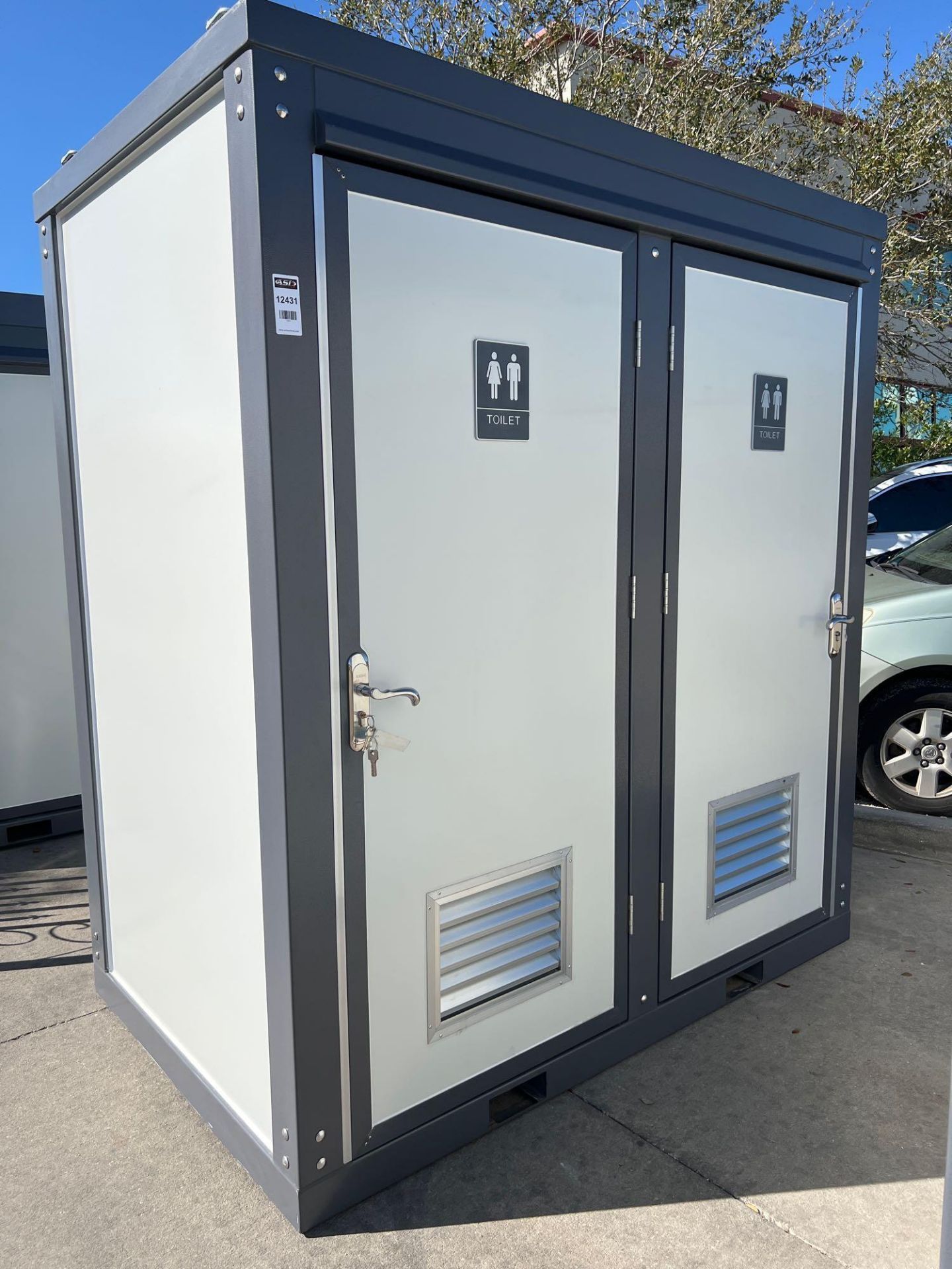 UNUSED PORTABLE DOUBLE BATHROOM UNIT, 2 STALLS, ELECTRIC & PLUMBING HOOK UP WITH EXTERIOR PLUMBING C