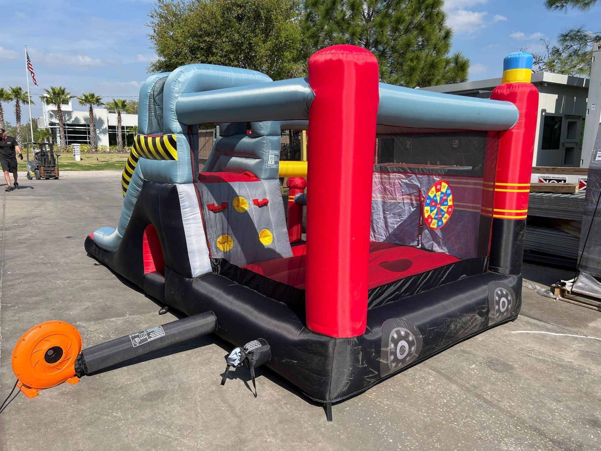 UNUSED BLOW-UP BOUNCY FIRE STATION PLAY YARD WITH SLIDE, VELCRO DARTS, BALLS, STAKES, & BLOWER - Image 6 of 12