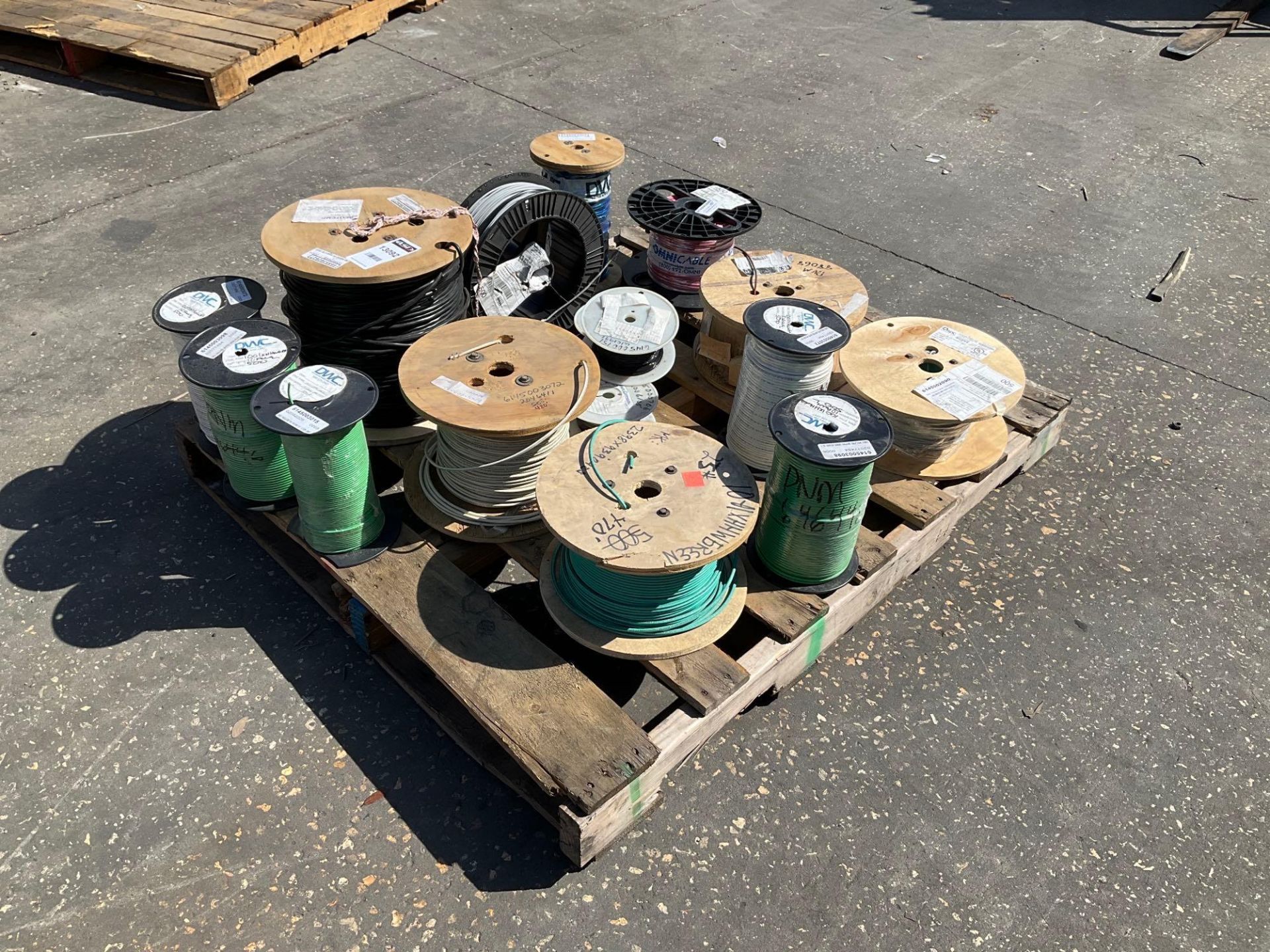 PALLET OF ASSORTED WIRES ON SPOOLS , APPROX 13 SPOOLS TOTAL