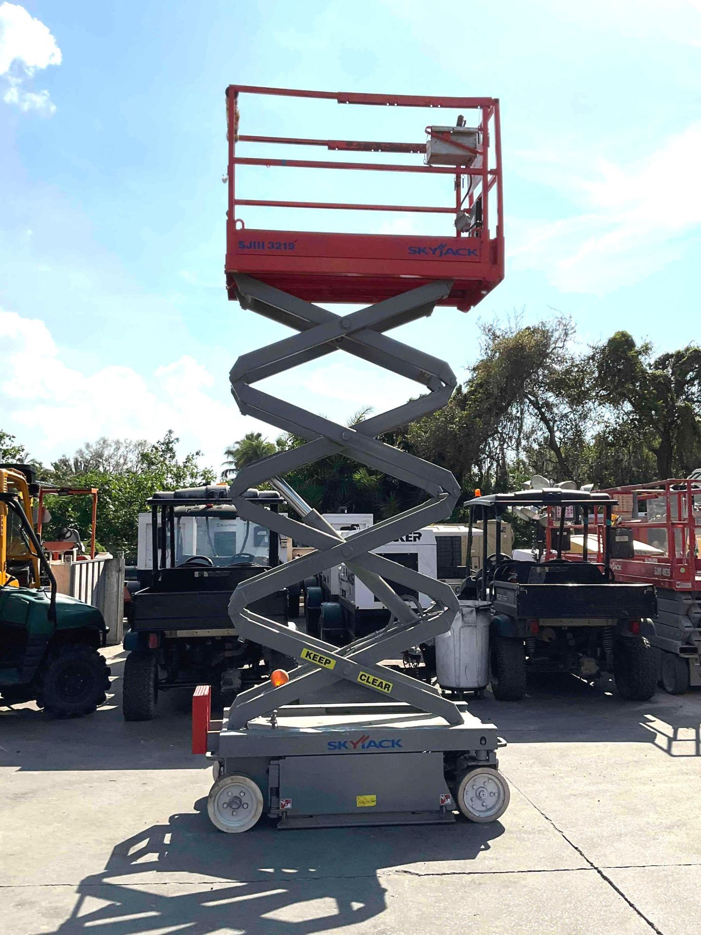 SKYJACK SCISSOR LIFT MODEL SJIII 3219, ELECTRIC, APPROX MAX PLATFORM HEIGHT 19FT, NON MARKING TIRES,