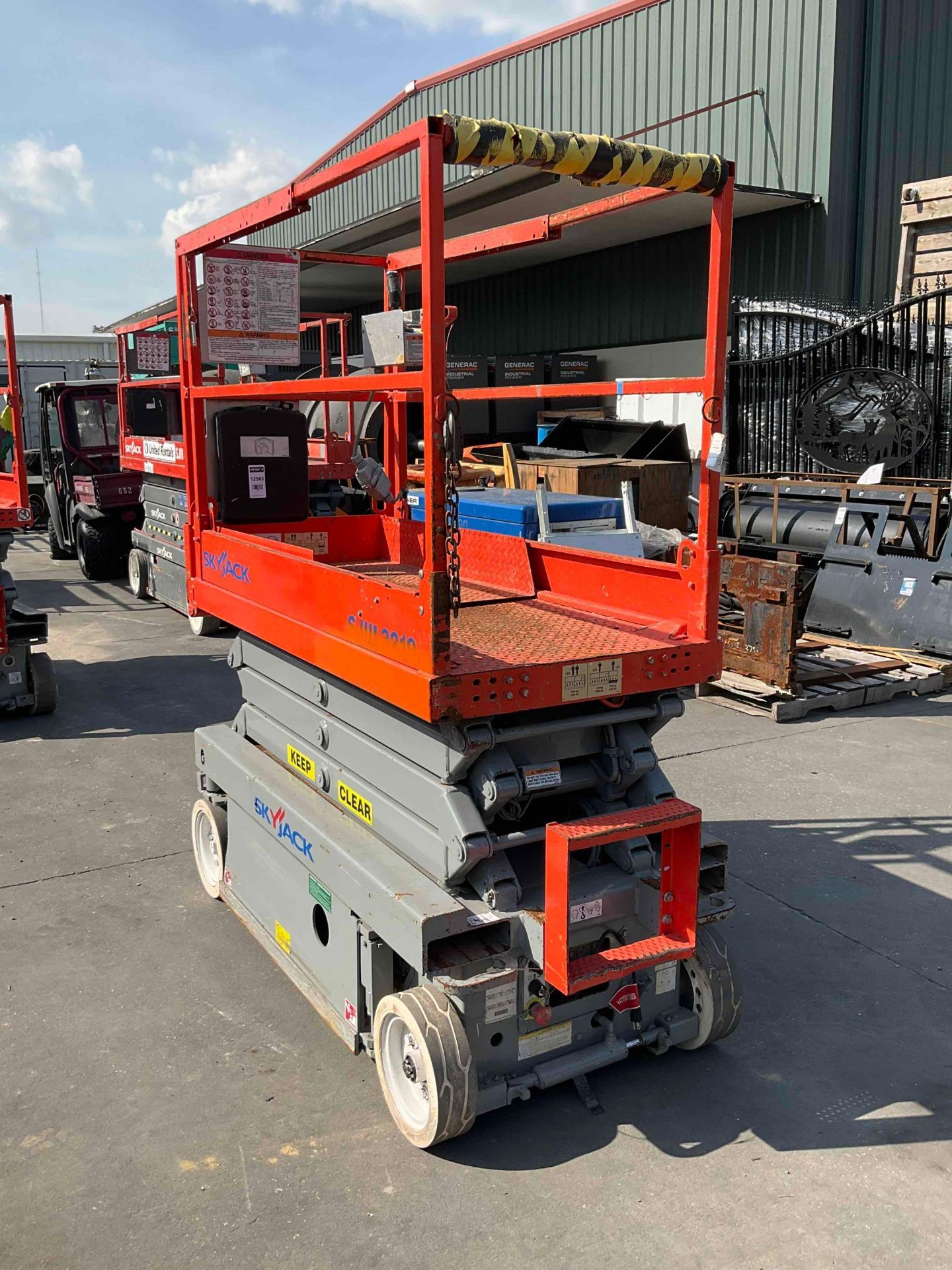 SKYJACK SCISSOR LIFT MODEL SJIII 3219, ELECTRIC, APPROX MAX PLATFORM HEIGHT 19FT, NON MARKING TIRES, - Image 7 of 13