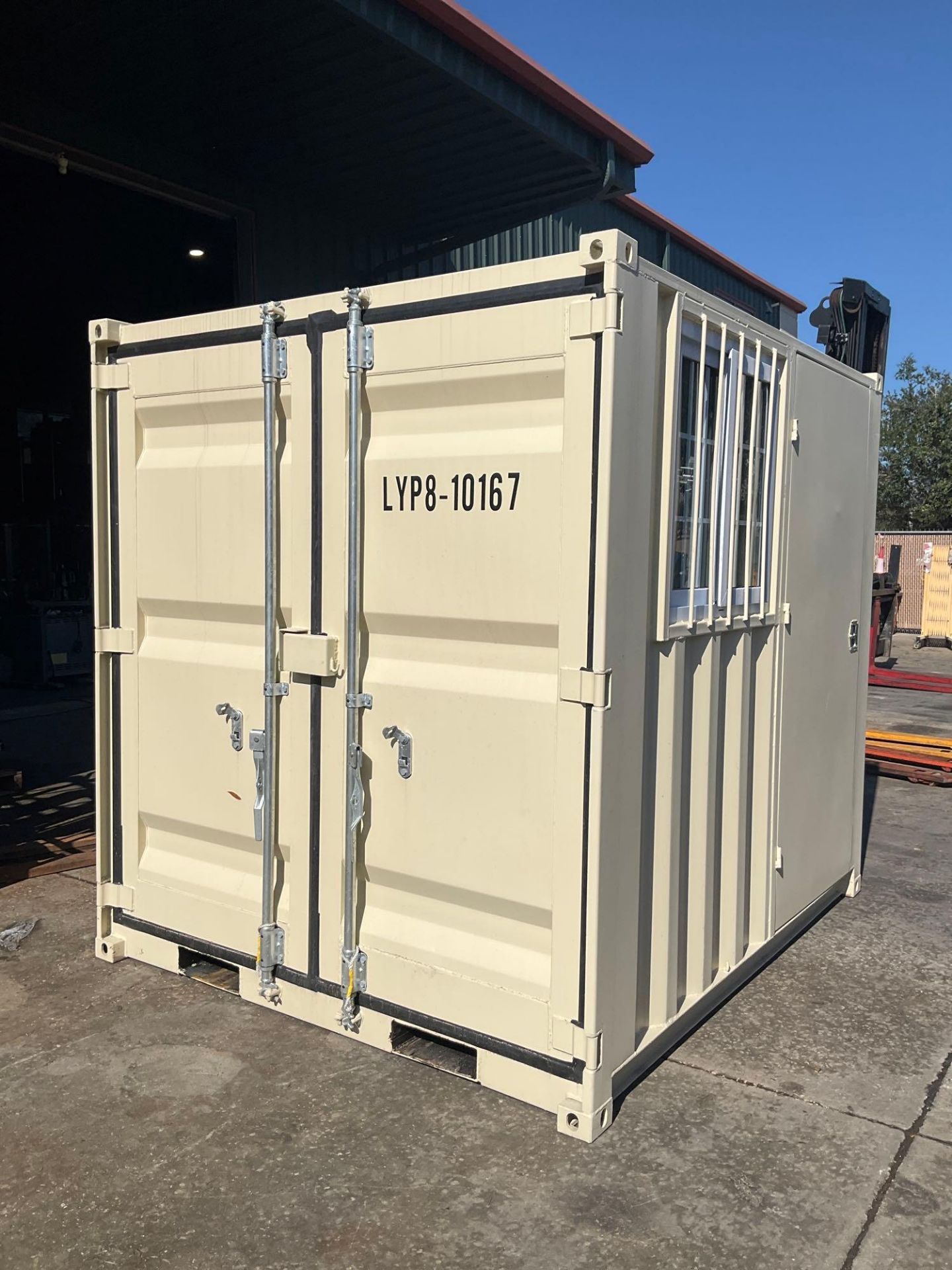 UNUSED 8' OFFICE / STORAGE CONTAINER, FORK POCKETS WITH SIDE DOOR ENTRANCE & SIDE WINDOW, APPROX 86'