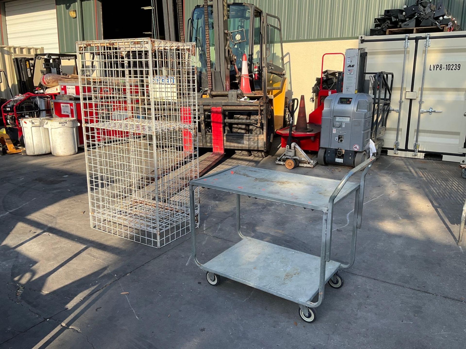 ( 1 ) STAINLESS STEEL FLAT SHELF CART ON WHEELS & ( 1 )  STORAGE CAGE, STORAGE CAGE APPROX 37” W x 2