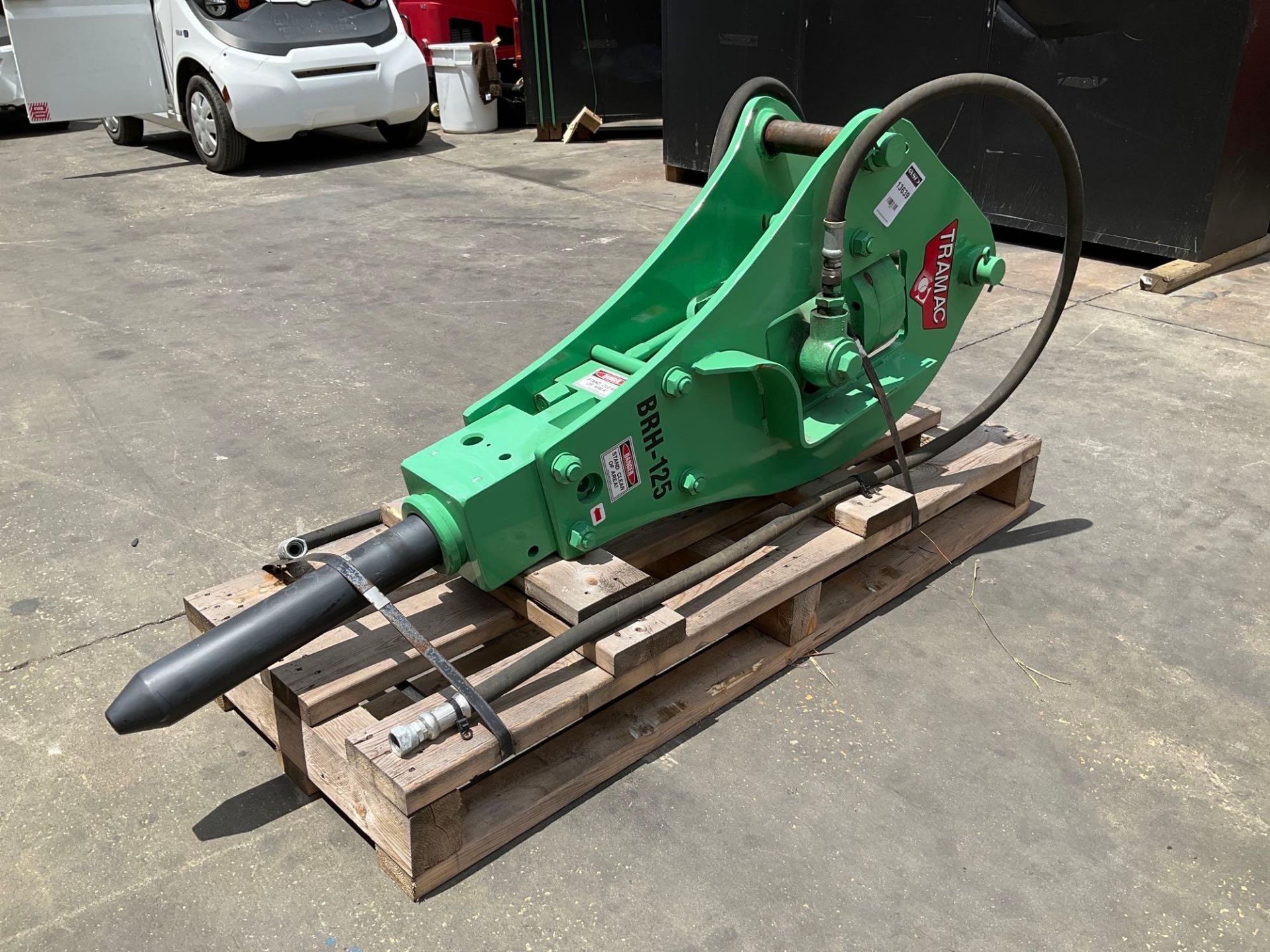 UNUSED TRAMAC HYDRAULIC HAMMER ATTACHMENT MODEL BRH 125, APPROX 66”