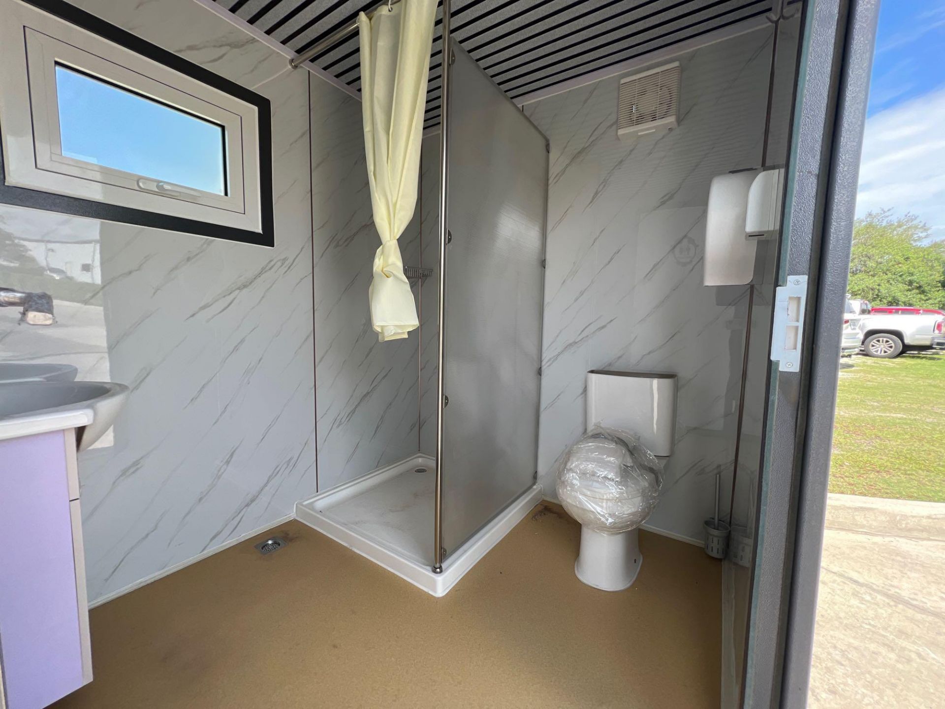 UNUSED PORTABLE BATHROOM UNIT WITH VANITY, SHOWER, TOILET, WINDOW, PLUMBING AND ELECTRIC HOOK UP, 11 - Image 12 of 13