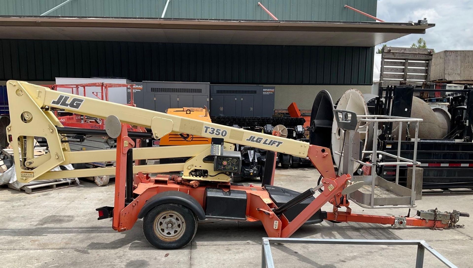 JLG BOOM LIFT MODEL T350, ELECTRIC, TOW BEHIND,  APPROX MAX PLATFORM HEIGHT 35FT