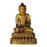 A Chinese Ming-type gilt bronze figure of Buddha Shakyamuni, marked Yongle, H 17,3 cm