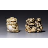 Two Japanese netsuke/okimono of shishi dogs, Edo/Meiji period, H 4 - 4,1 cm / 47g - 38g (+)