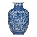 A Chinese blue and white 'Lotus scrolls' vase, with a Qianlong mark, H 29,5 cm