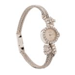 An 18ct platinum Sigma ladies' watch, set with brilliant-cut diamonds