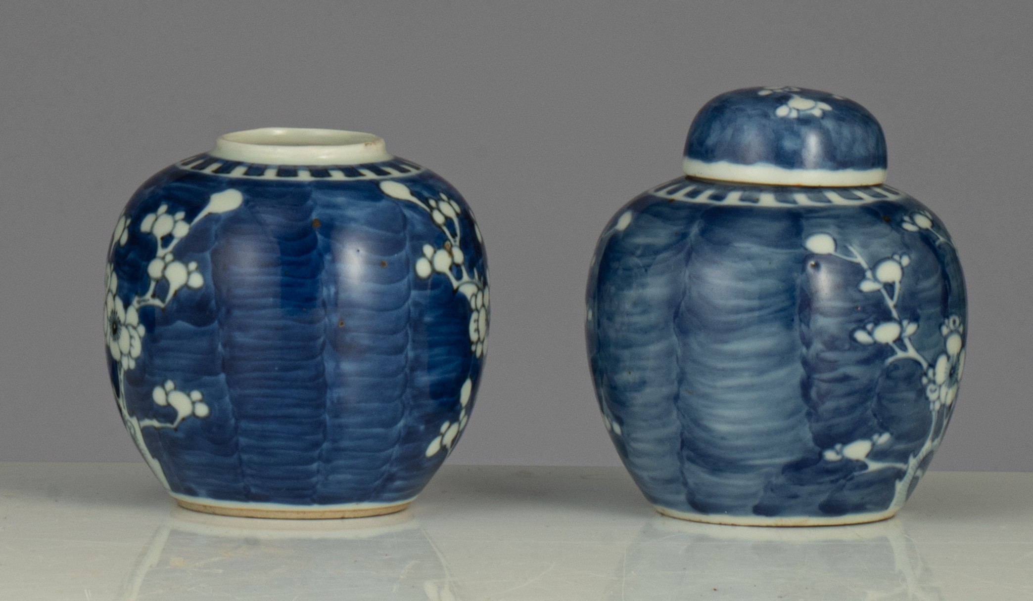 A collection of Chinese 'Prunus on cracked ice' pattern vases and jars, famille rose figures and pot - Image 26 of 37