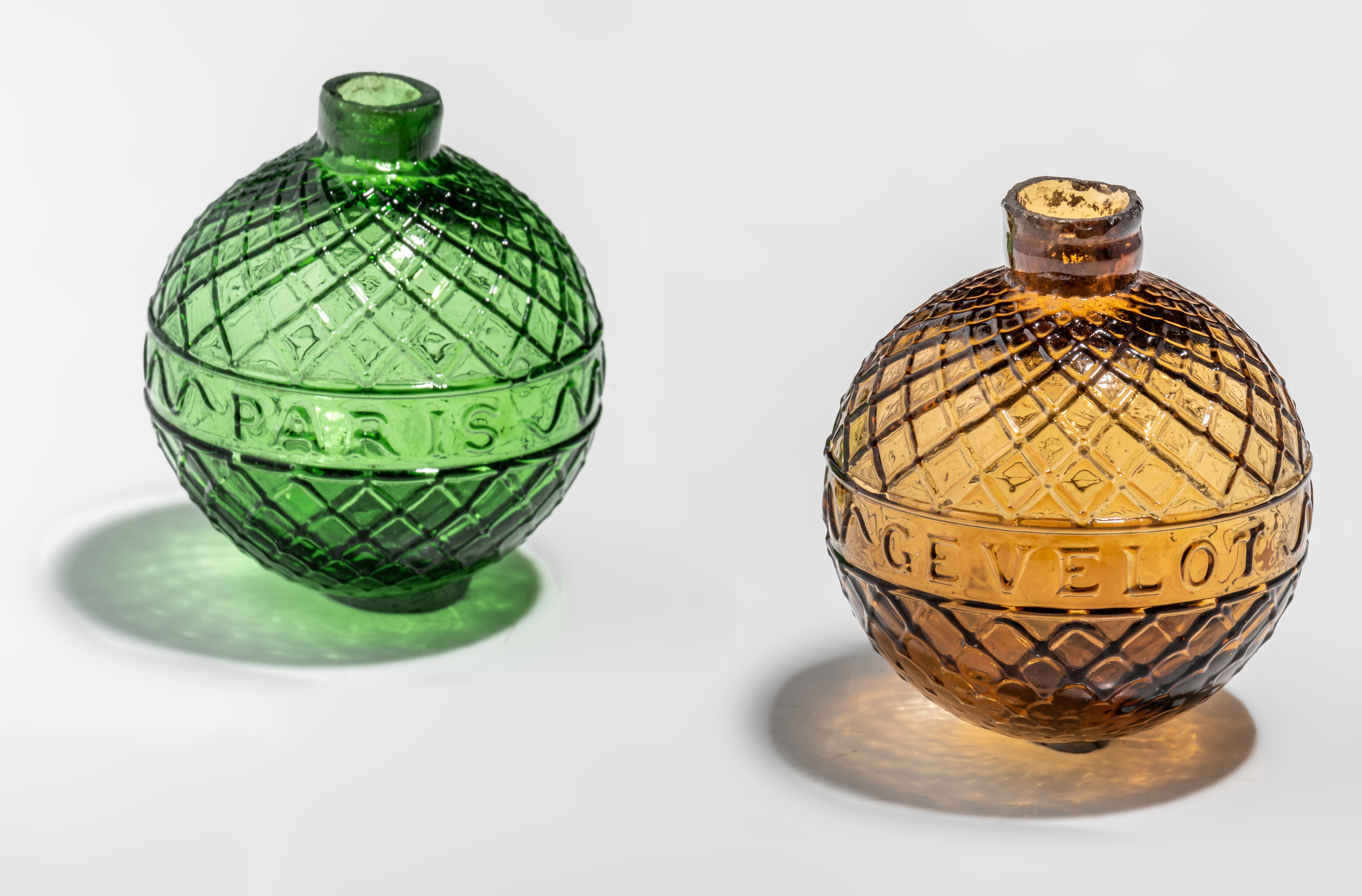 Two target balls, green and amber-coloured moulded glass, marked Gevelot - Paris, 1875-1900, H 7 cm - Image 2 of 9