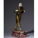 A chryselephantine sculpture in gilded and polychromed bronze and ivory, H 30,5 cm (with base) (+)