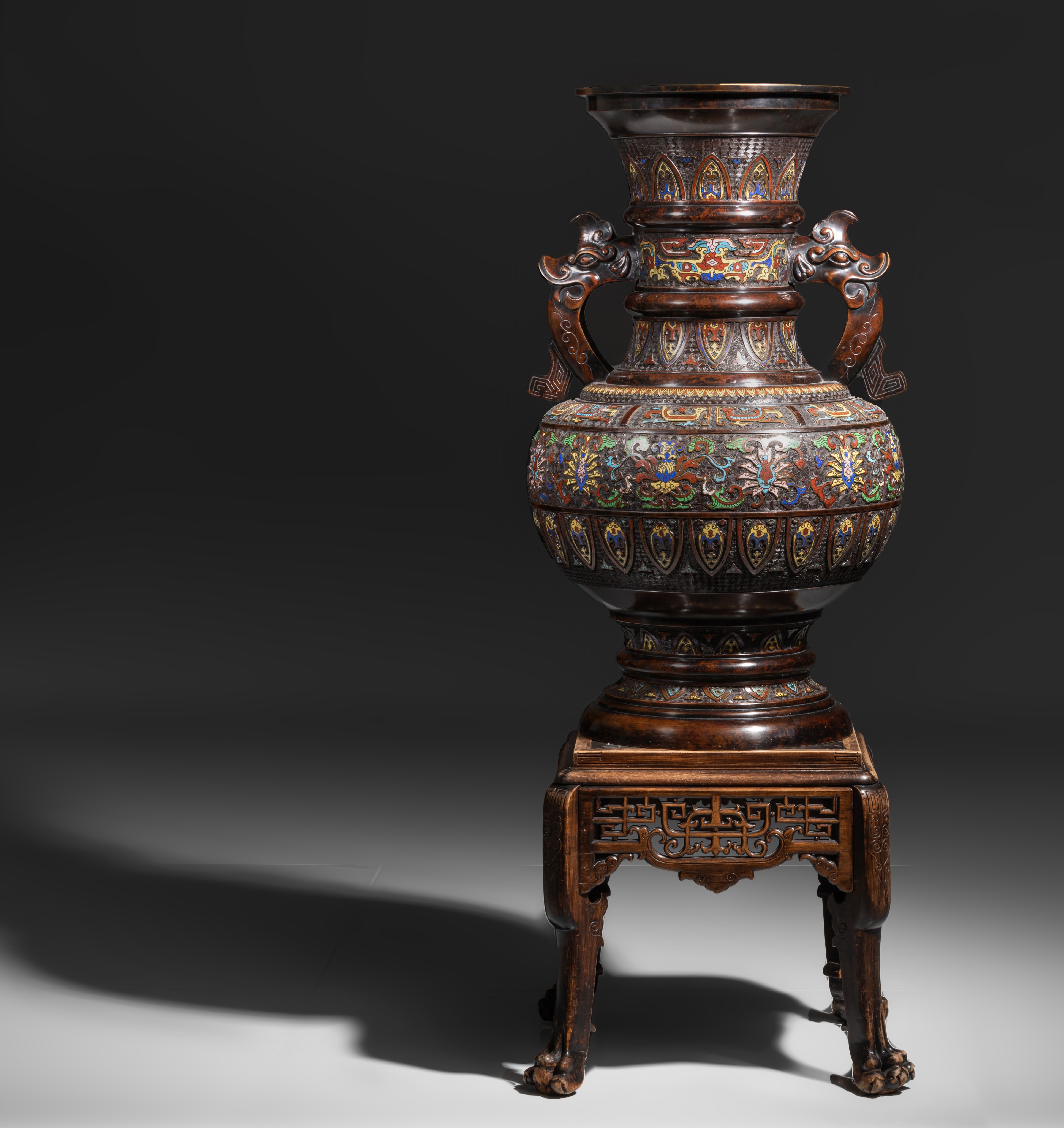 A large Japanese champlevé enamelled bronze vase, late Meiji, paired with beast handles, H 111,5 cm