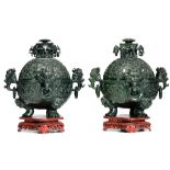 A monumental pair of Chinese dark green jade censers and covers, H 45,5 - W 45,5 - ø 33 cm