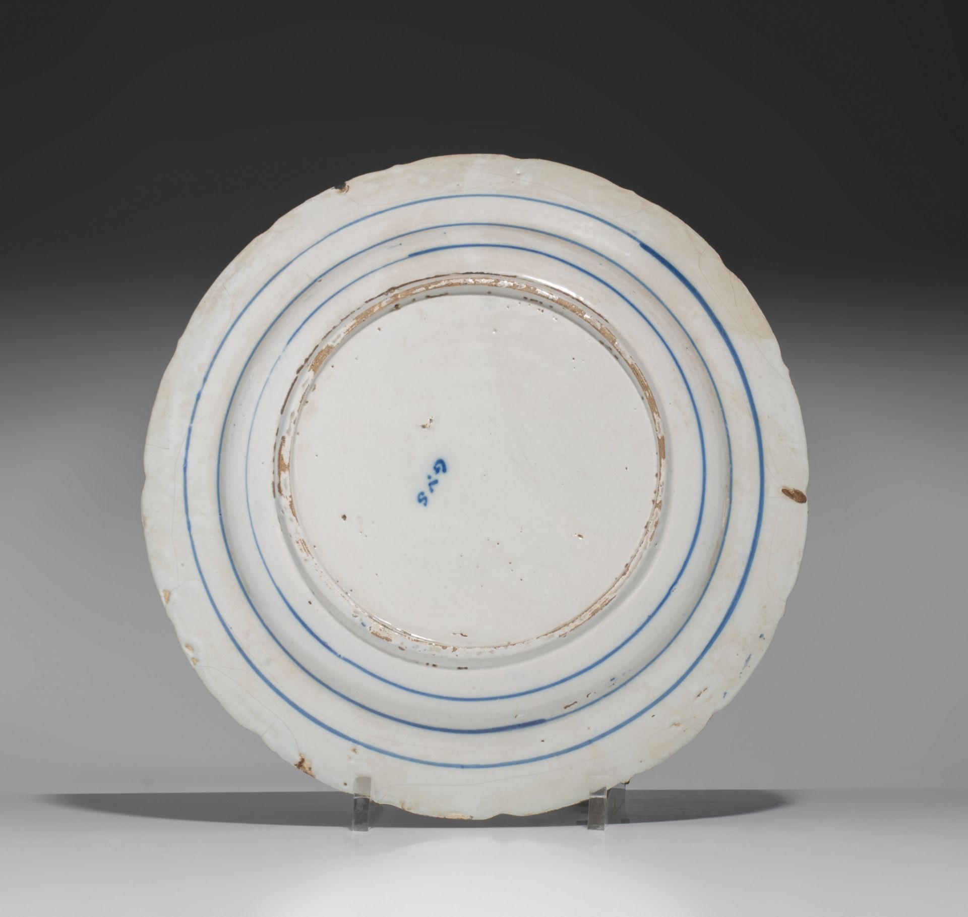 A pair of 18thC Delft plates by Geertruy Verstelle, added 12 blue and white plates, ø 16 - 34 cm - Image 5 of 17