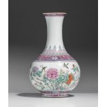 A fine Chinese famille rose 'Birds and Flowers' bottle vase, with a Qianlong mark, Republic period,