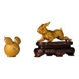 Two gold ornaments, one depicting a rabbit and the other one a rat, modern, presumably Hong Kong, sm