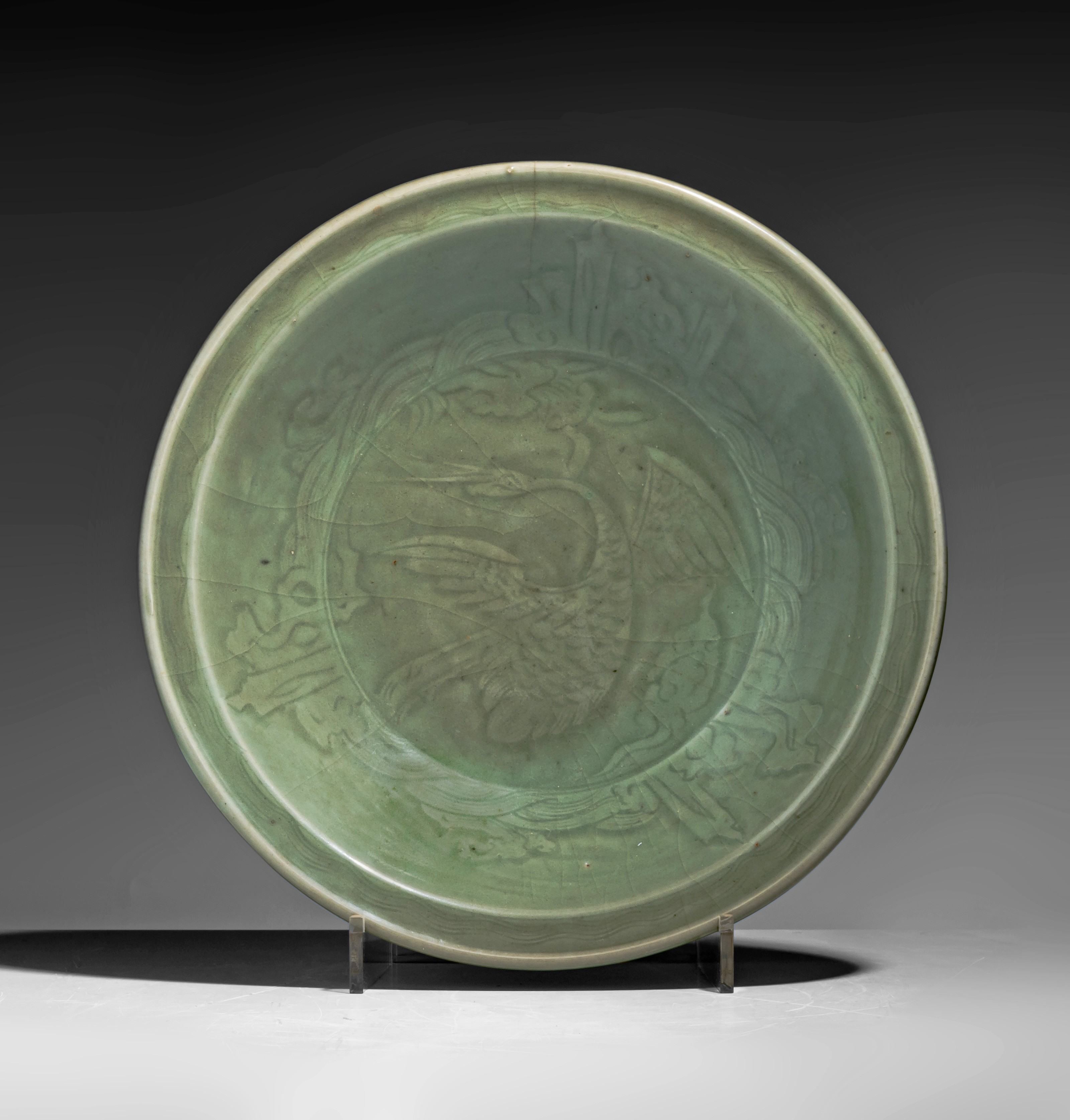 A Chinese carved Longquan celadon 'Crane' charger, Ming period, ø 37,5 cm - Image 2 of 3