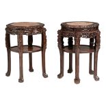 A pair of Chinese carved rosewood stands, with marble plaques, late Qing, H 80 - 81,5 cm