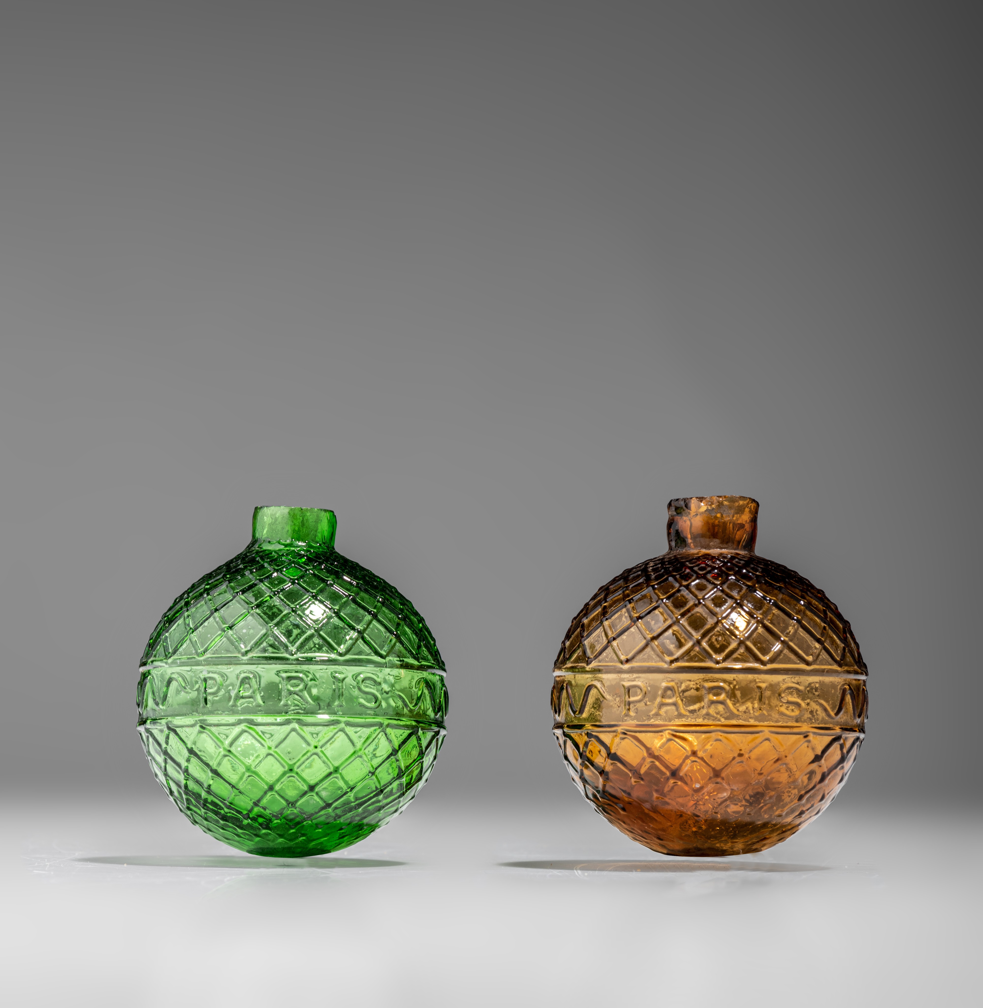 Two target balls, green and amber-coloured moulded glass, marked Gevelot - Paris, 1875-1900, H 7 cm - Image 4 of 9