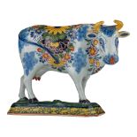An 18thC polychrome decorated cow in Delft earthenware, marked Jan Pennis, H 16,5 cm