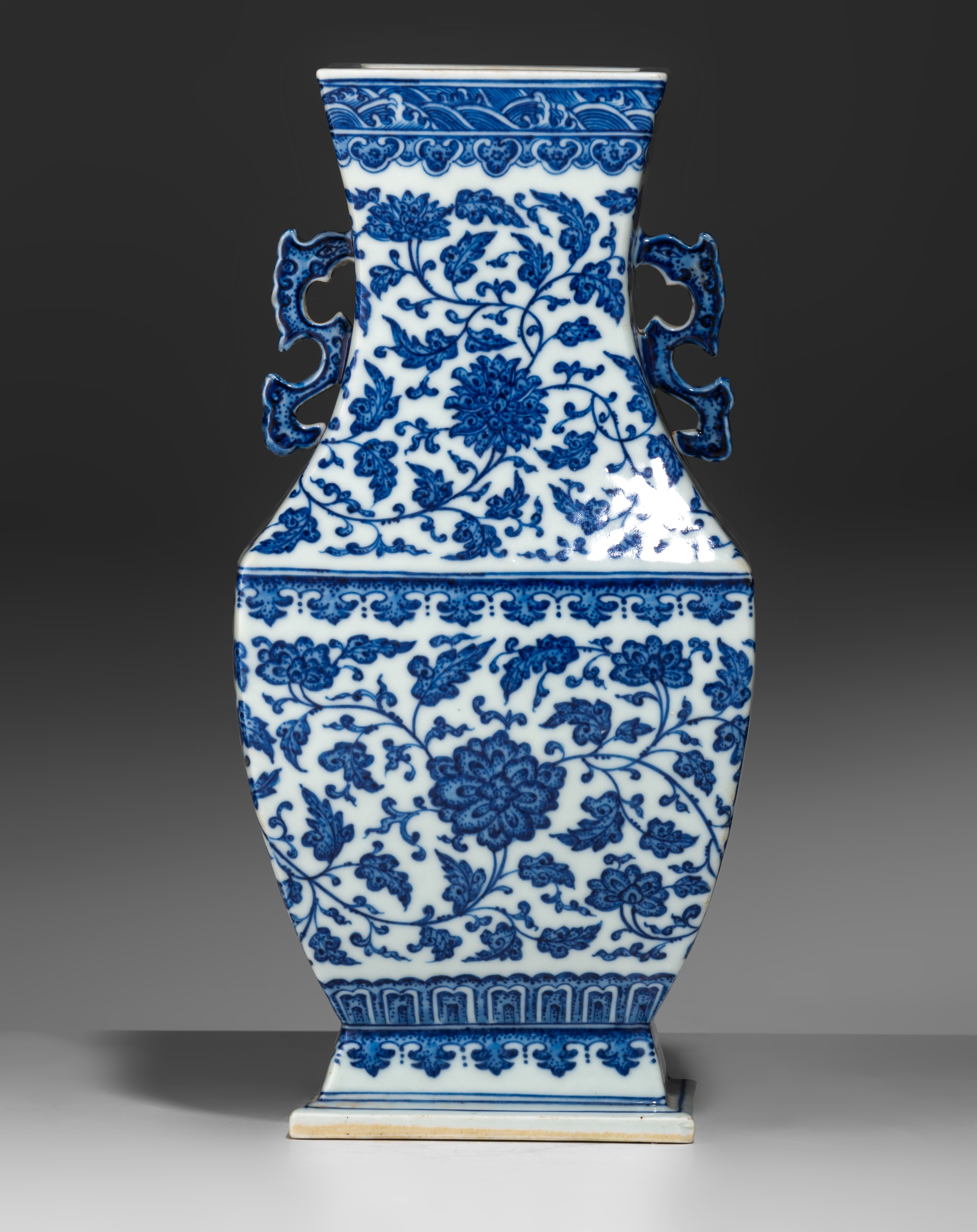 A Chinese blue and white 'Lotus scrolls' fanghu vase, paired with dragon handles, with a Qianlong ma - Image 5 of 9