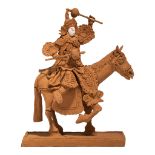 A decorative biscuit figure of a Chinese warrior on horseback, Total H 41 cm
