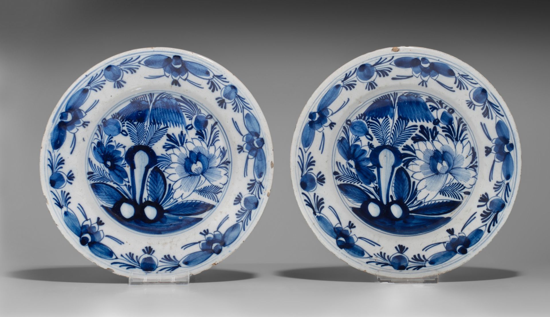 A pair of 18thC Delft plates by Geertruy Verstelle, added 12 blue and white plates, ø 16 - 34 cm - Image 8 of 17