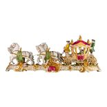 A polychrome and gilt Saxony porcelain group of an abundantly decorated Rococo carriage, W 78 cm