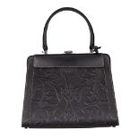 A Delvaux 'Jumping Illusion' handbag in black leather, with adjustable covers