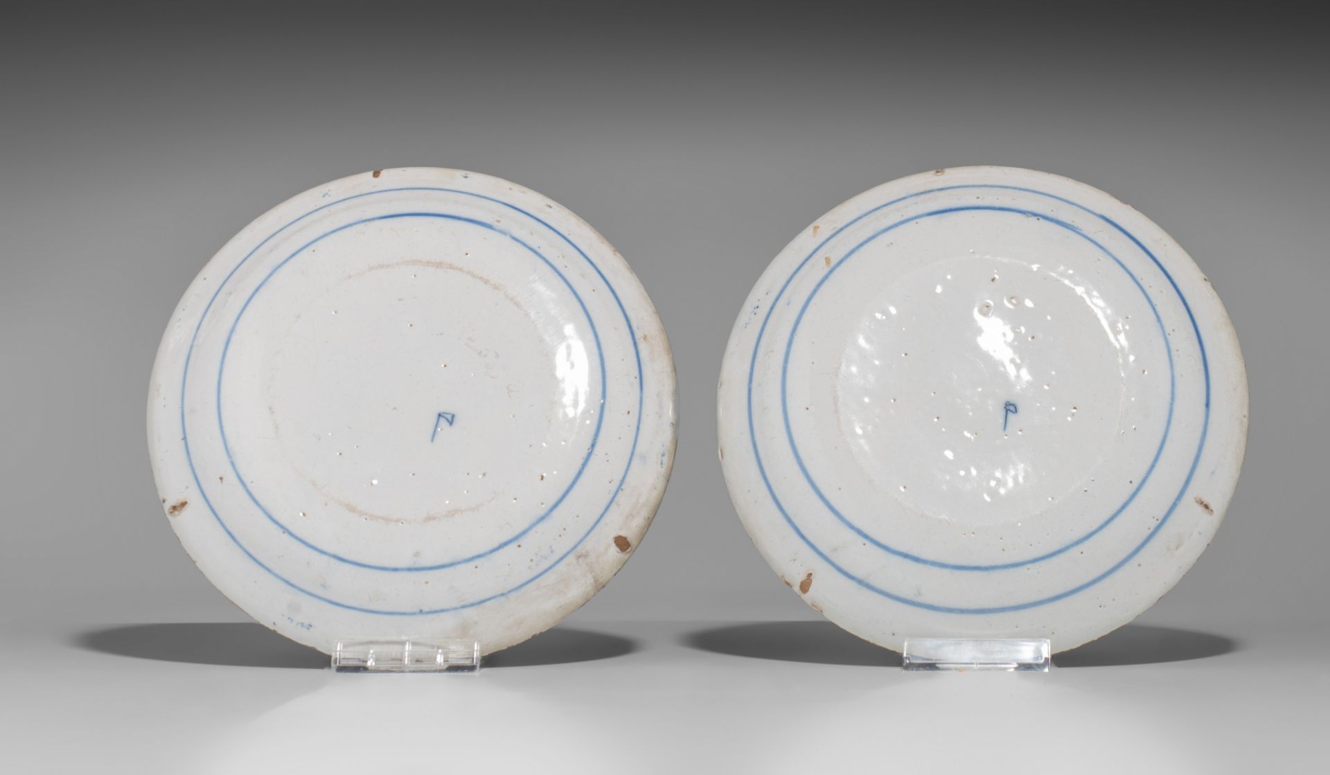 A pair of 18thC Delft plates by Geertruy Verstelle, added 12 blue and white plates, ø 16 - 34 cm - Image 15 of 17