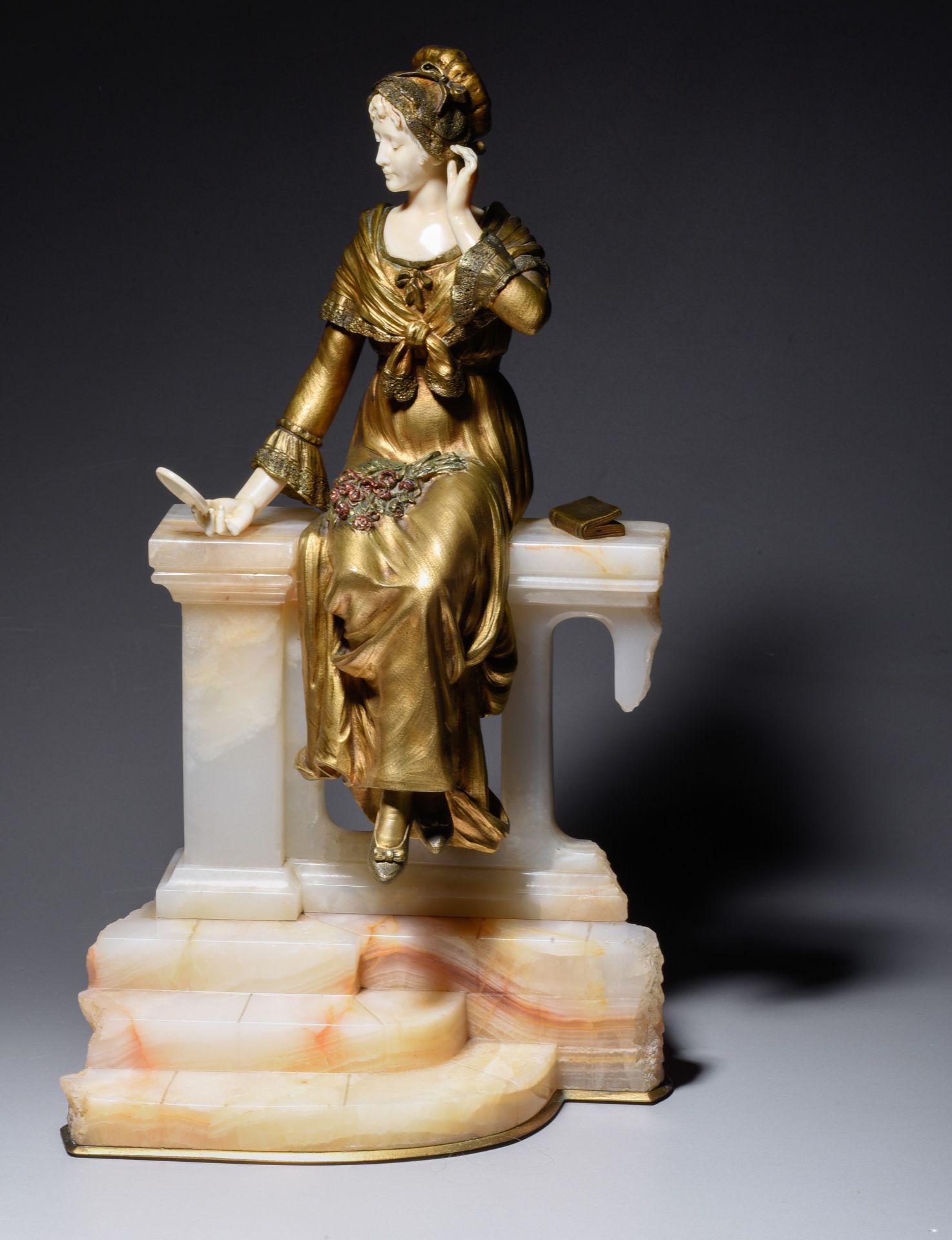 A chryselephantine, polychrome gilded bronze and ivory, H 40,5 cm (incl. base) (+) - Image 2 of 5