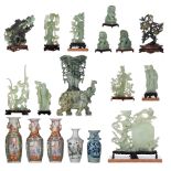 A collection of Chinese jadeite sculptures, 20thC, tallest H 37,5 cm