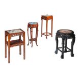 A collection of four high hardwood stands, three with a marble top, one with a cloisonné enamelled b