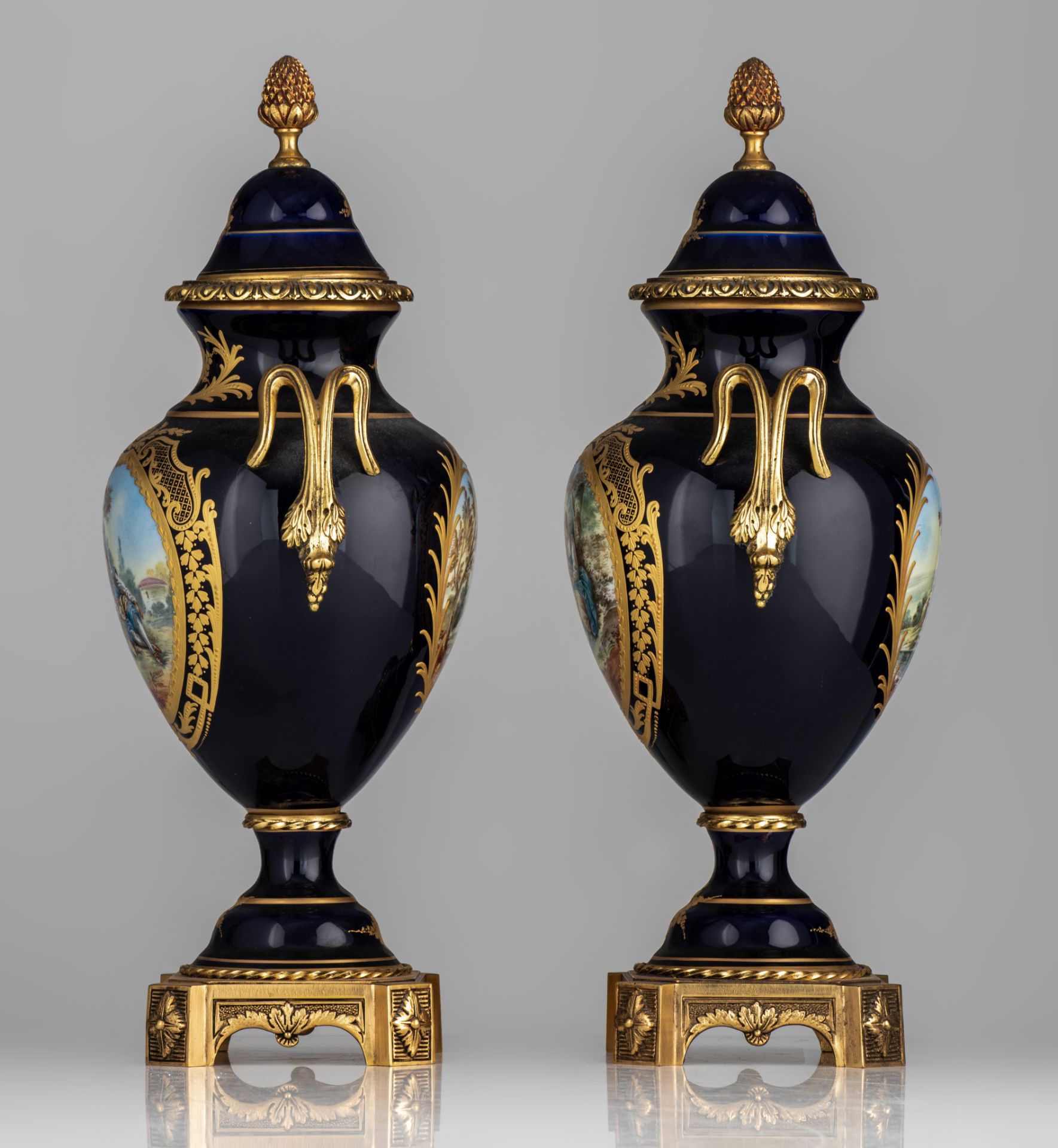 A three-piece Sèvres garniture set, decorated with gallant scenes, signed 'J. Césana', H 28,5 - 42,5 - Image 9 of 15