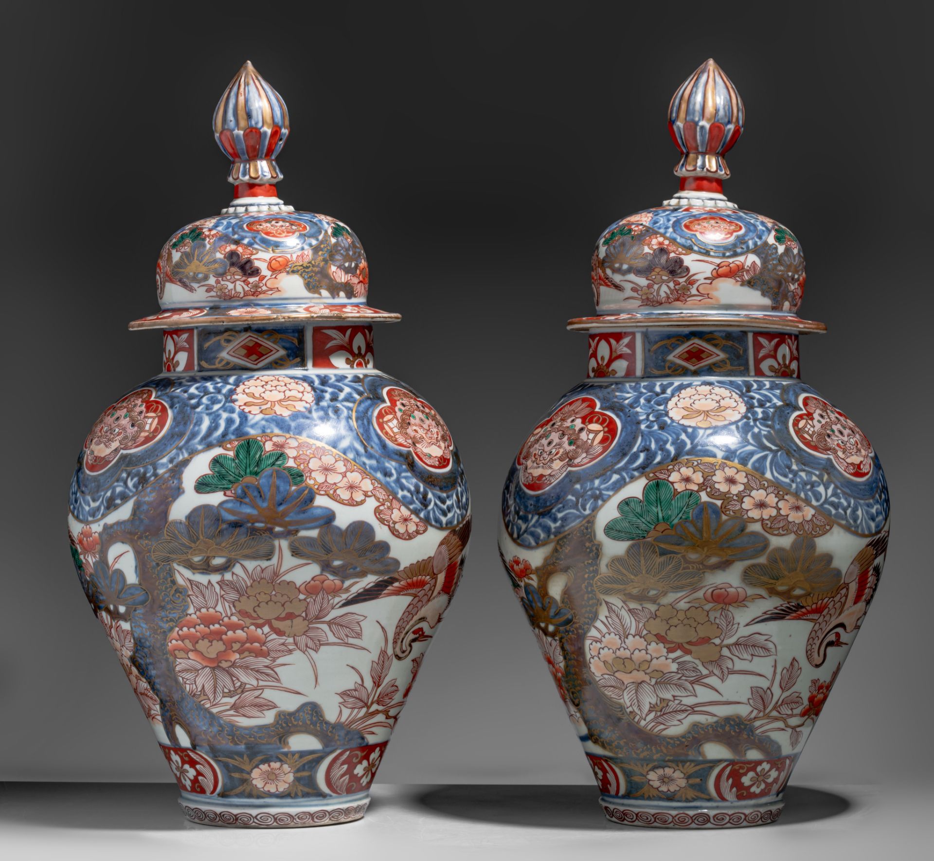 A similar pair of large Japanse Imari 'Crane' vases and covers, Edo period, late 18thC, H 64,5 cm - Image 3 of 9