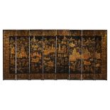 A Chinese export eight-panel gilt and black lacquer screen, late Qing dynasty, late 18thC/early 19th